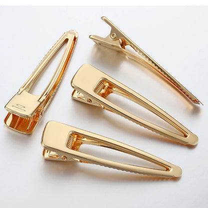 Gold alligator clips, perfect for creating unique hair accessories and bows. Ideal for DIY crafts